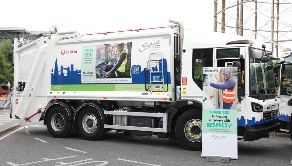 A collection vehicle and banner show the StreetKind campaign, thanking residents for treating Veolia's frontline operatives with respect.