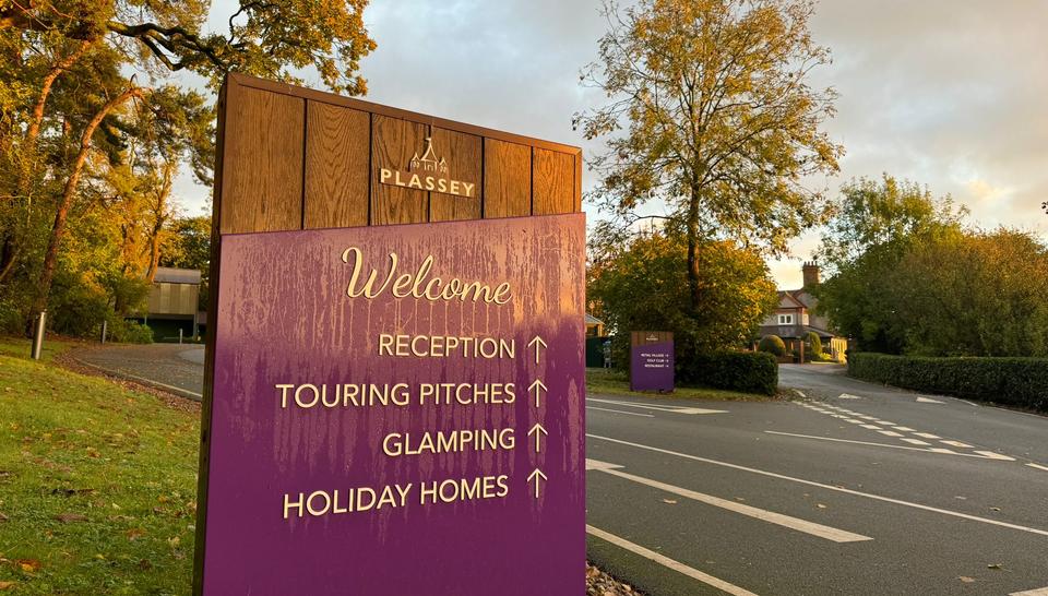 Plassey holiday park welcome sign and veolia lorry