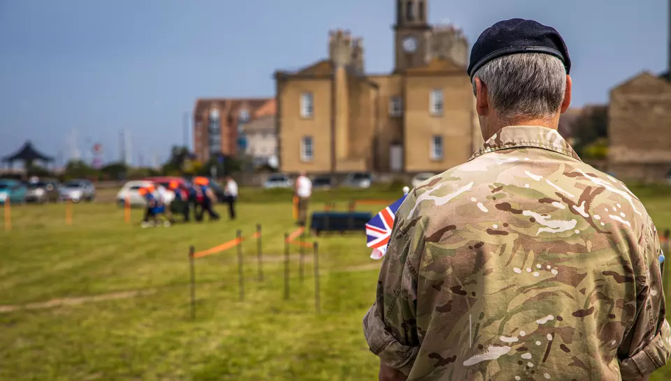 Soldier holding union jack flag 