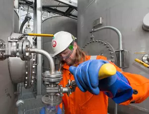 Veolia employee using machinery