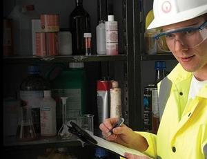 Veolia employee with clipboard and pen