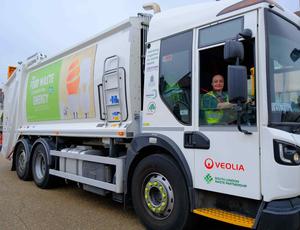 Female veolia waste truck driver 