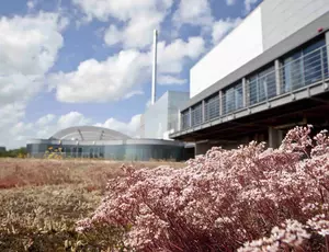 building with fields surrounding it 