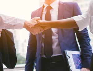 close up view of a hand shake 