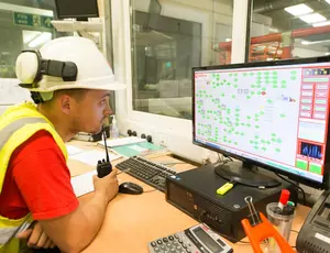 man looking at computer 