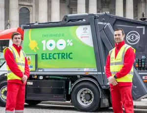 2 men standing by a bin lorry 