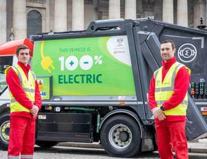 2 men standing by a bin lorry 