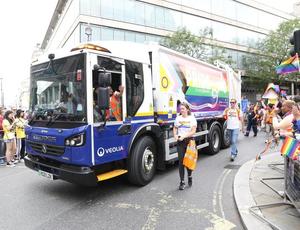 Electric waste collection vehicle at pride parade