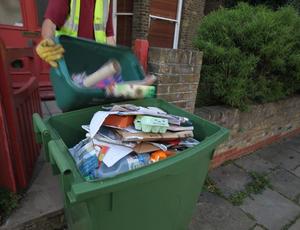 a bin full with rubbish 
