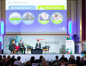 Stage of speakers at the Sustainable Futures event