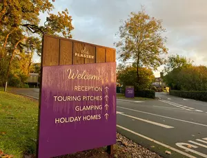 Plassey holiday park welcome sign and veolia lorry