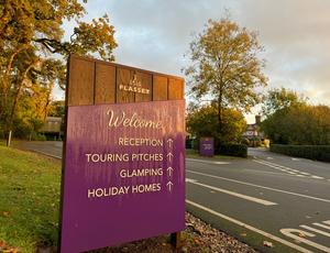 Plassey holiday park welcome sign and veolia lorry