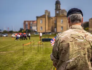 Soldier holding union jack flag 