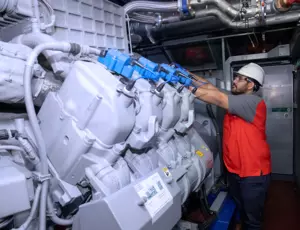 Veolia worker inspecting combined heat and power CHP