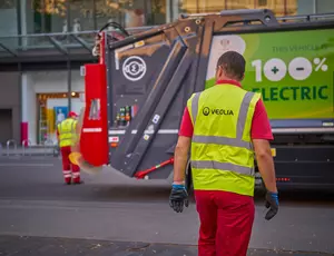 Waste collection operatives and lorry