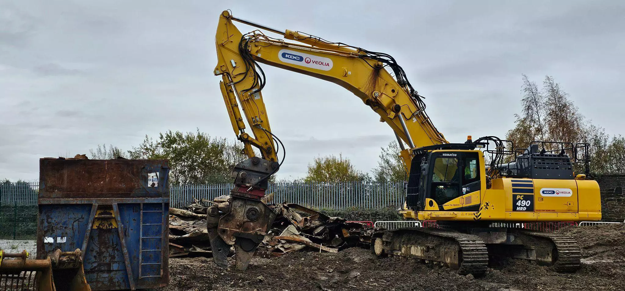 Heavy machinery working on demolishing a gas holder at National Grid 