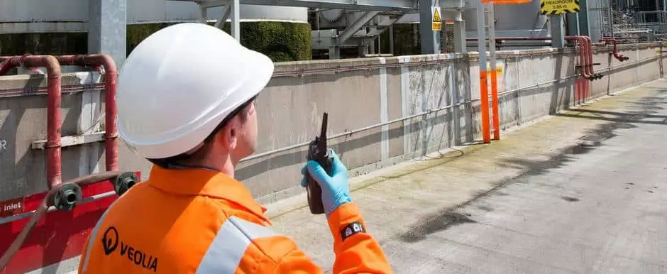 man working talking on a radio