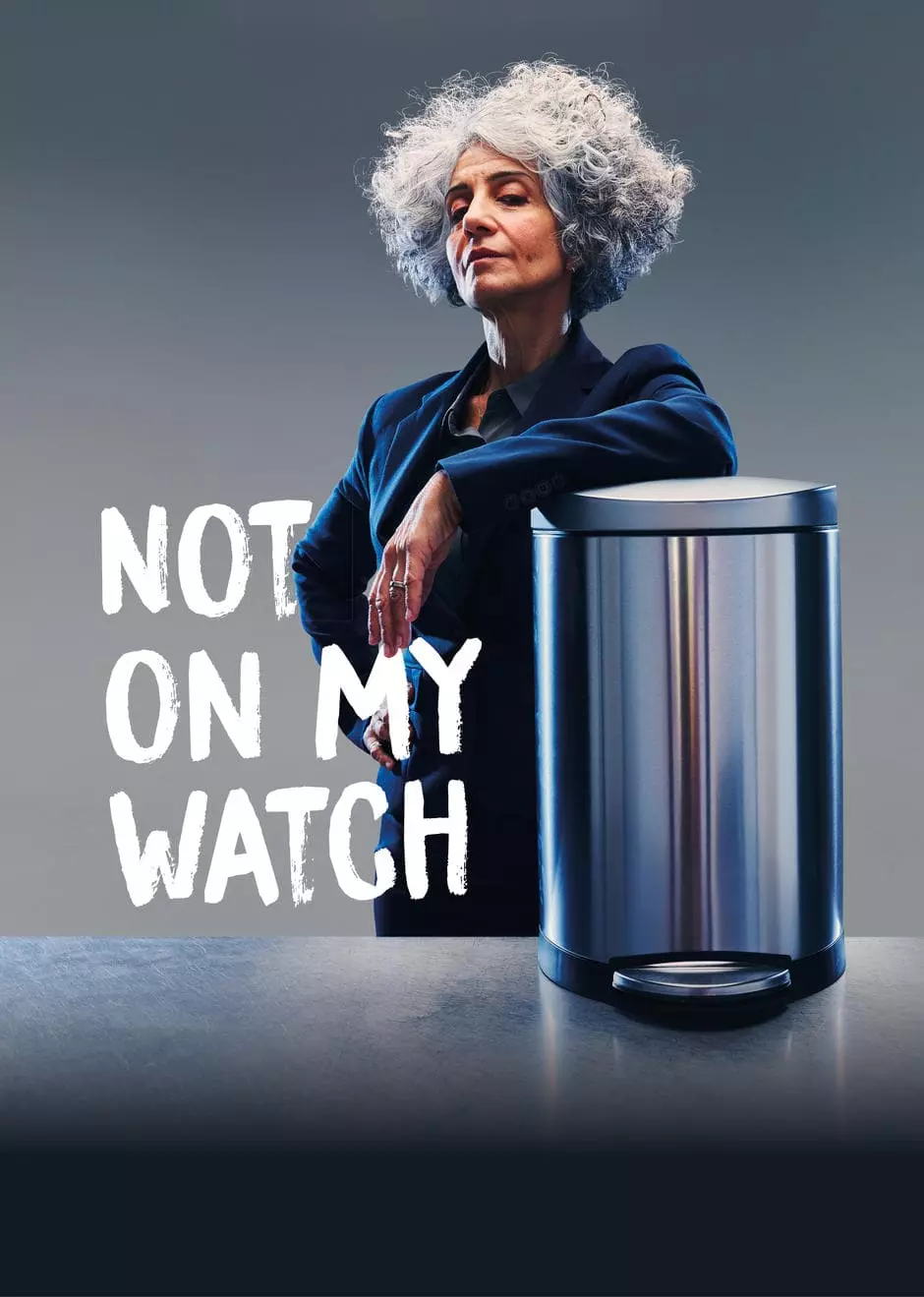 Woman leaning on a bin