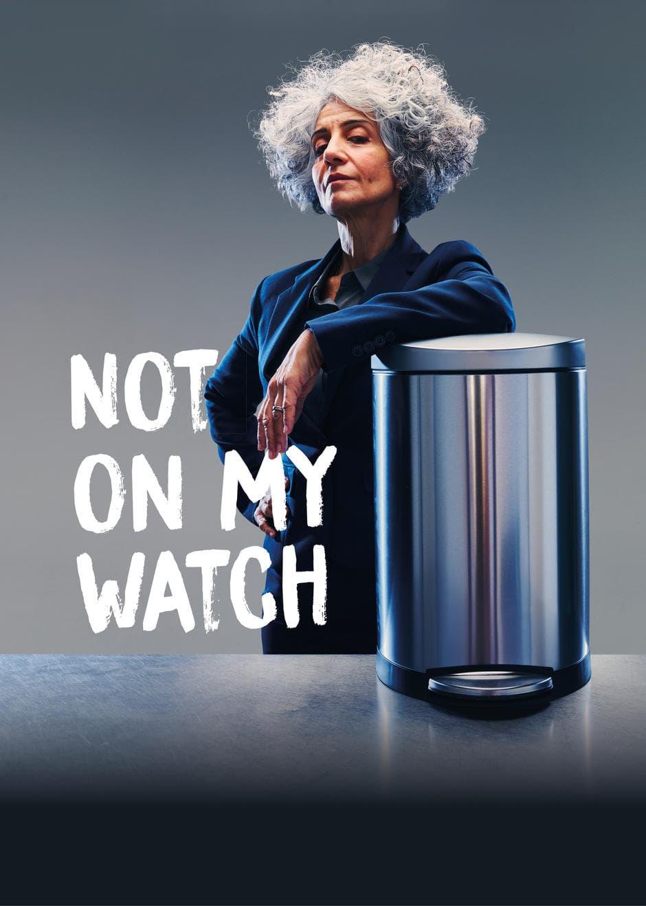 Woman leaning on a bin 