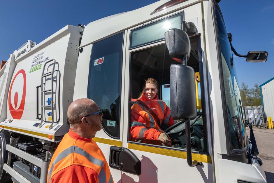 Veolia Truck with driver and man in high visibility PPE