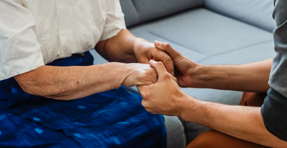 Two People Holding Hands