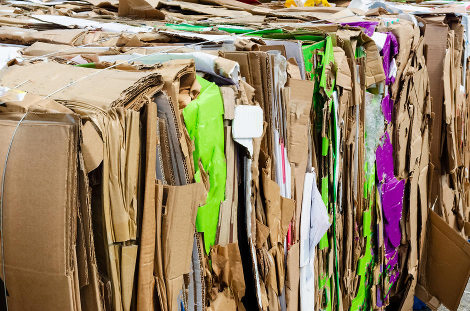 A photo of a bale of flattened cardboard.