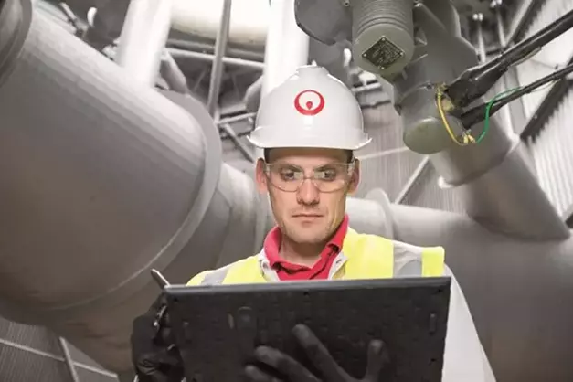 Veolia worker doing CHP maintenance 
