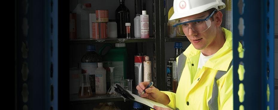 Veolia employee with clipboard and pen