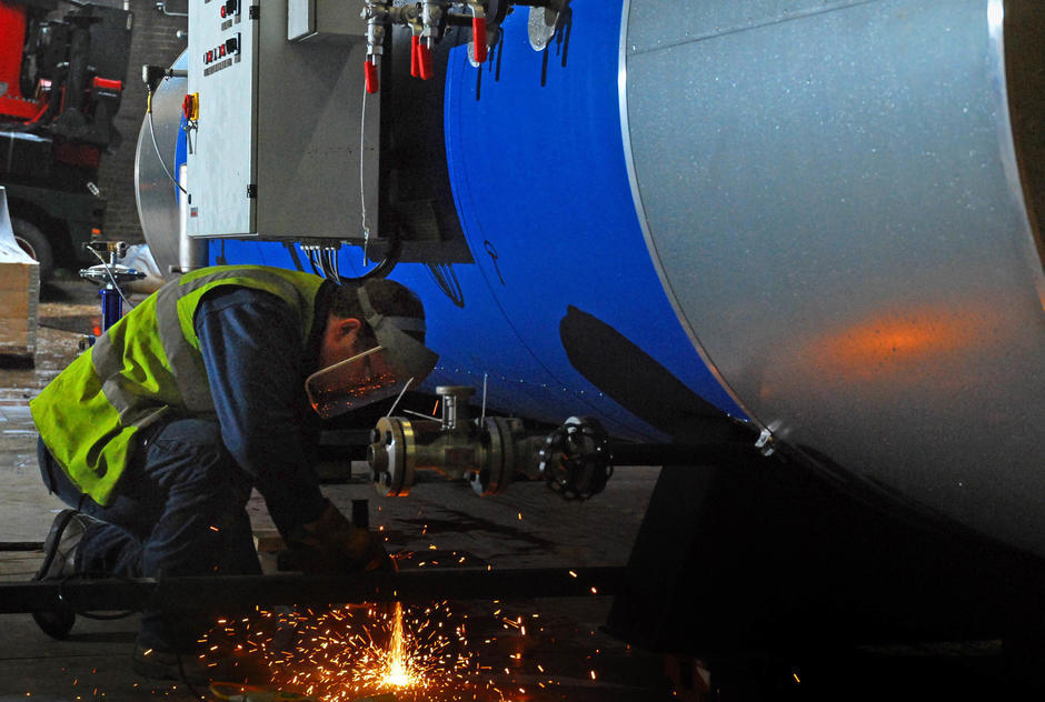 man working on a machine