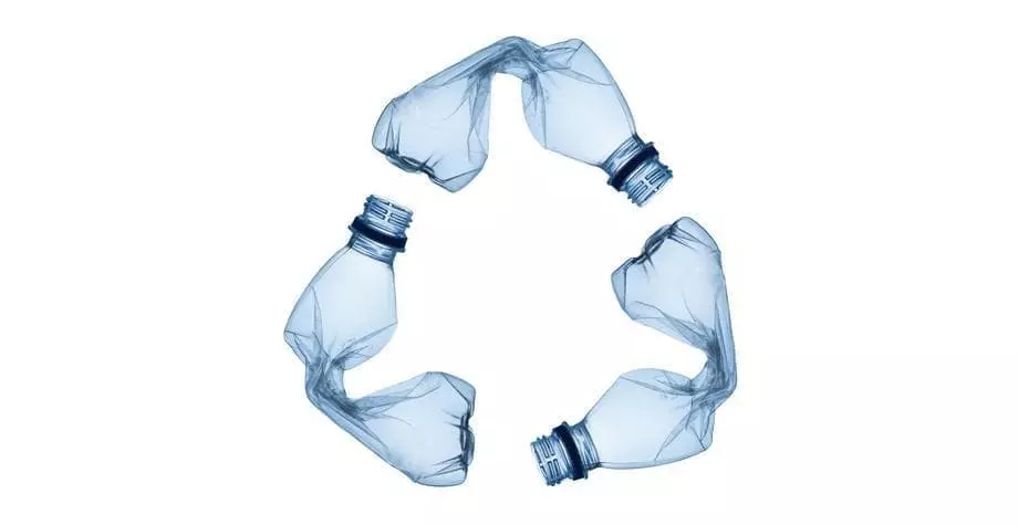recycling logo made of plastic bottles 
