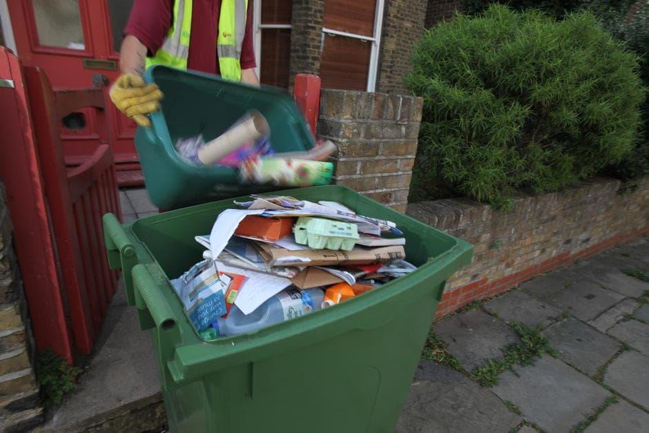 a bin full with rubbish 