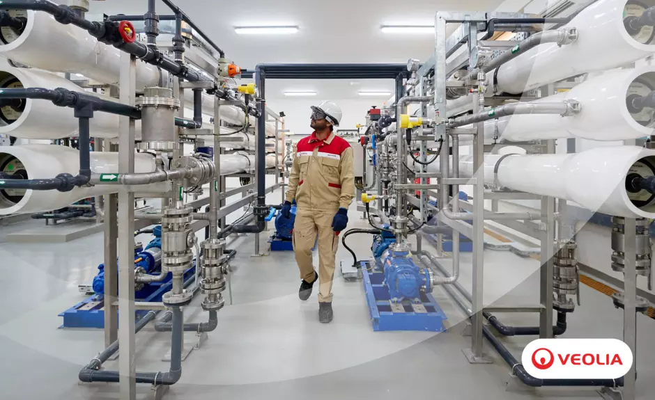 veolia worker walking down a corridor 
