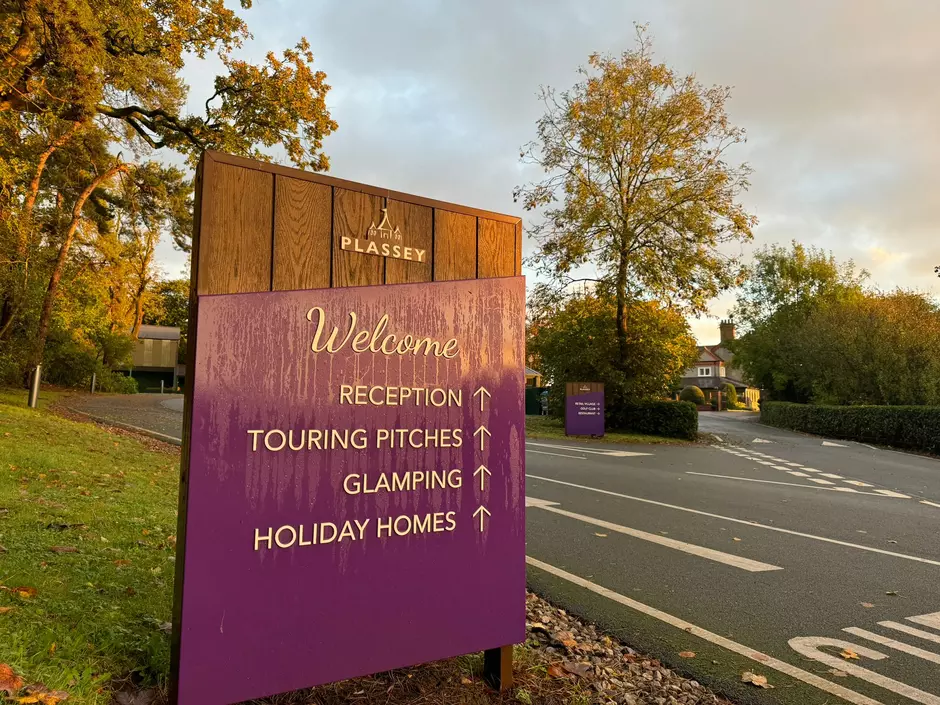 Plassey holiday park welcome sign and veolia lorry