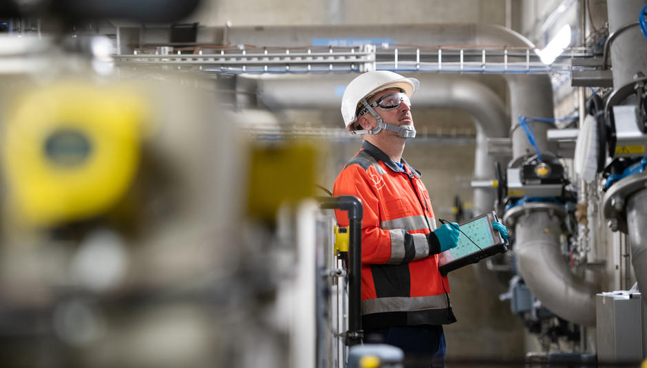 A Veolia staff checking water pipe systems for maintenance 