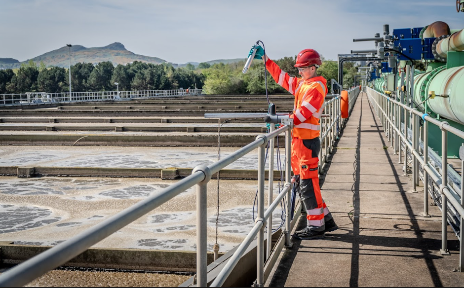 A Veolia staff checking water pipe systems for maintenance 