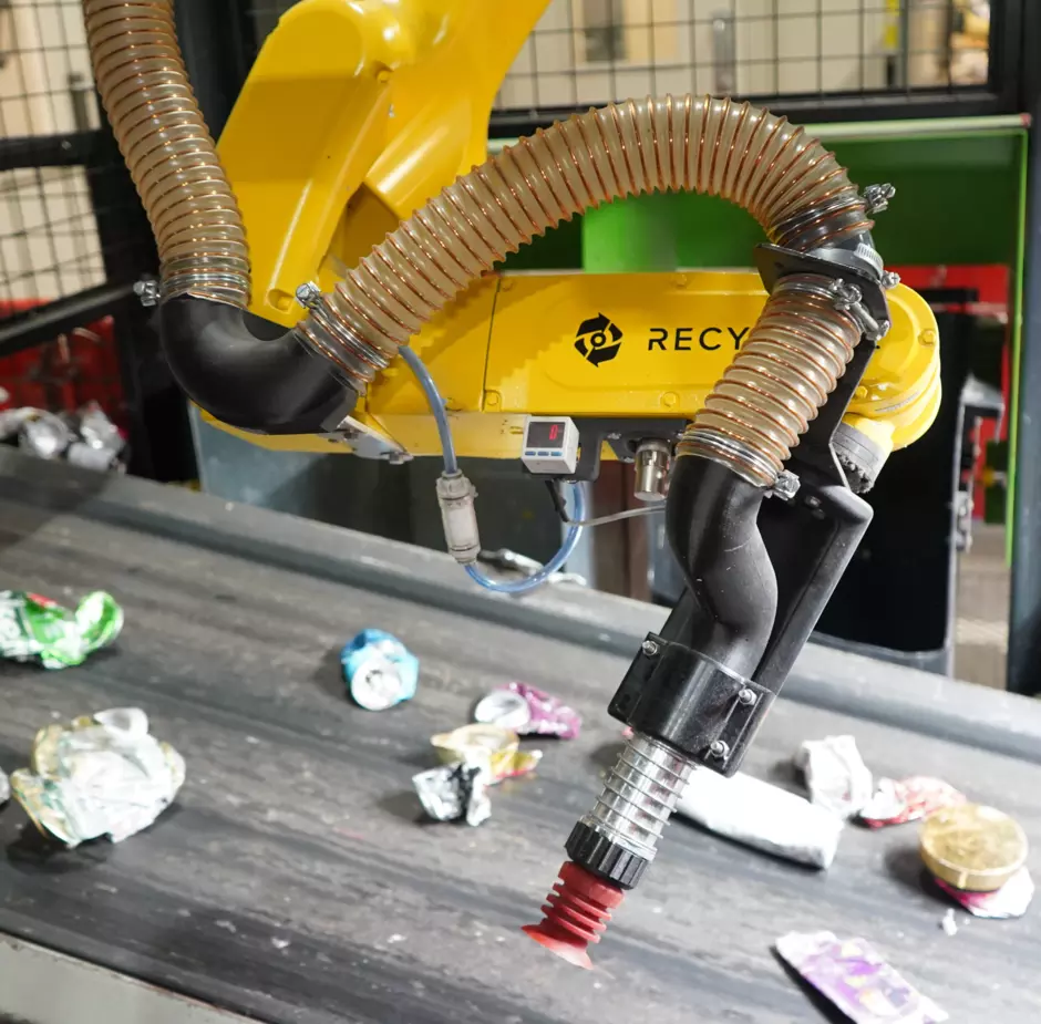A photo of Veolia's AI Robotic Arm that sorts through materials in their Materials Recovery Facility in London.