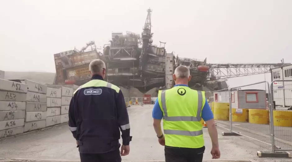 KDC Veolia workers walking by decommissioning