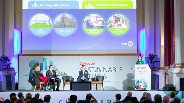 Stage of speakers at the Sustainable Futures event