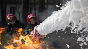 Firefighter using the liquid firefighting foams containing PFAS