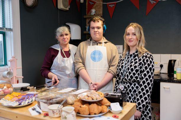 Ascent College student Owen, Ascent Teaching Support Assistant Anne, Ascent Teacher and Project Lead Lauren Molyneux, at the opening of the Lyme & Wood Café and Shop, November 2022