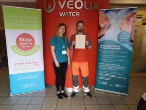 Lee Foster received is stop smoking cert from Cancer Focus NI